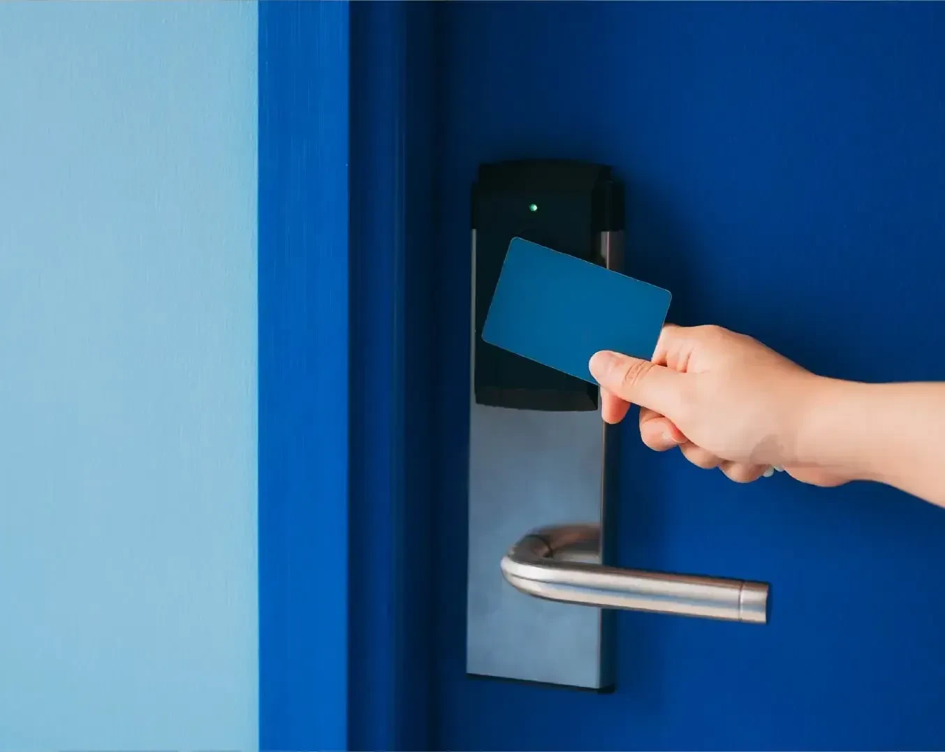 Close-up of a branded room access card placed on a hotel bedside table, representing a stylish Hotel Key Card.