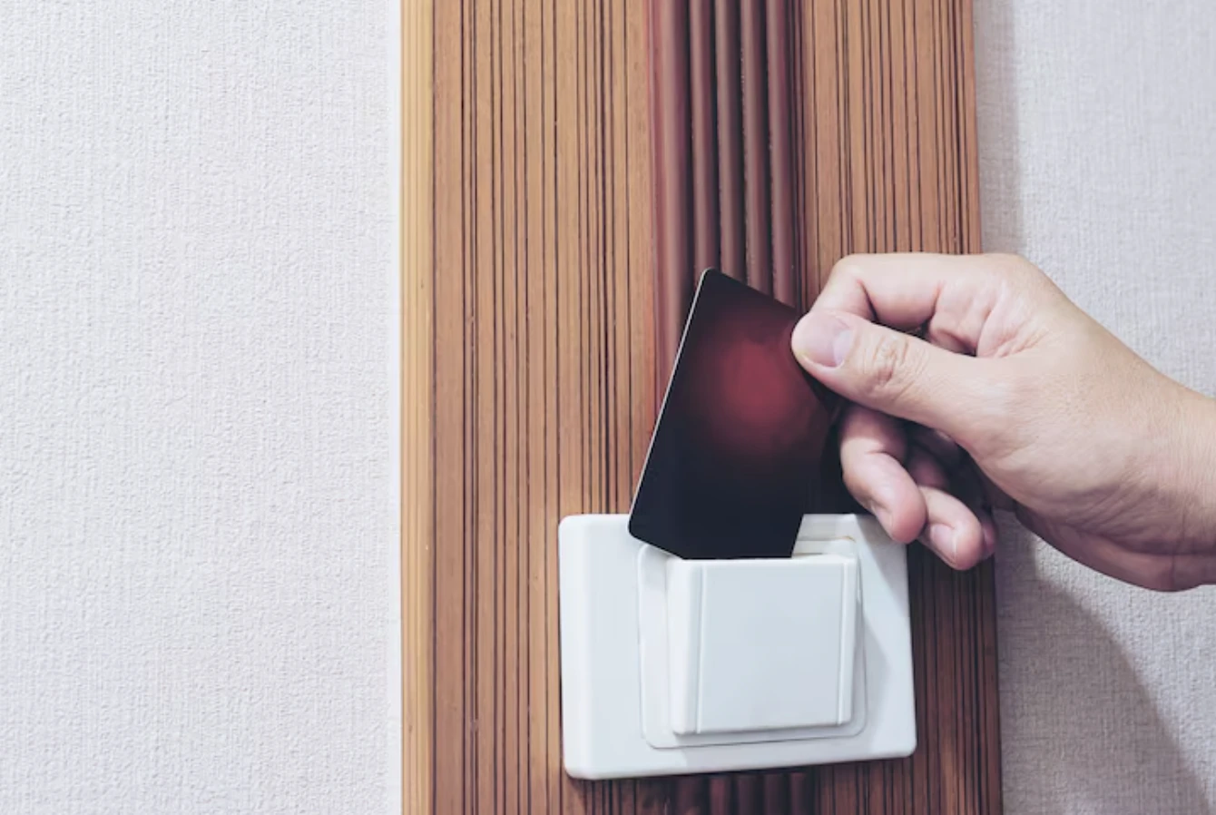 Modern RFID card unlocking a hotel room door, showcasing the convenience of a Hotel Key Card system.